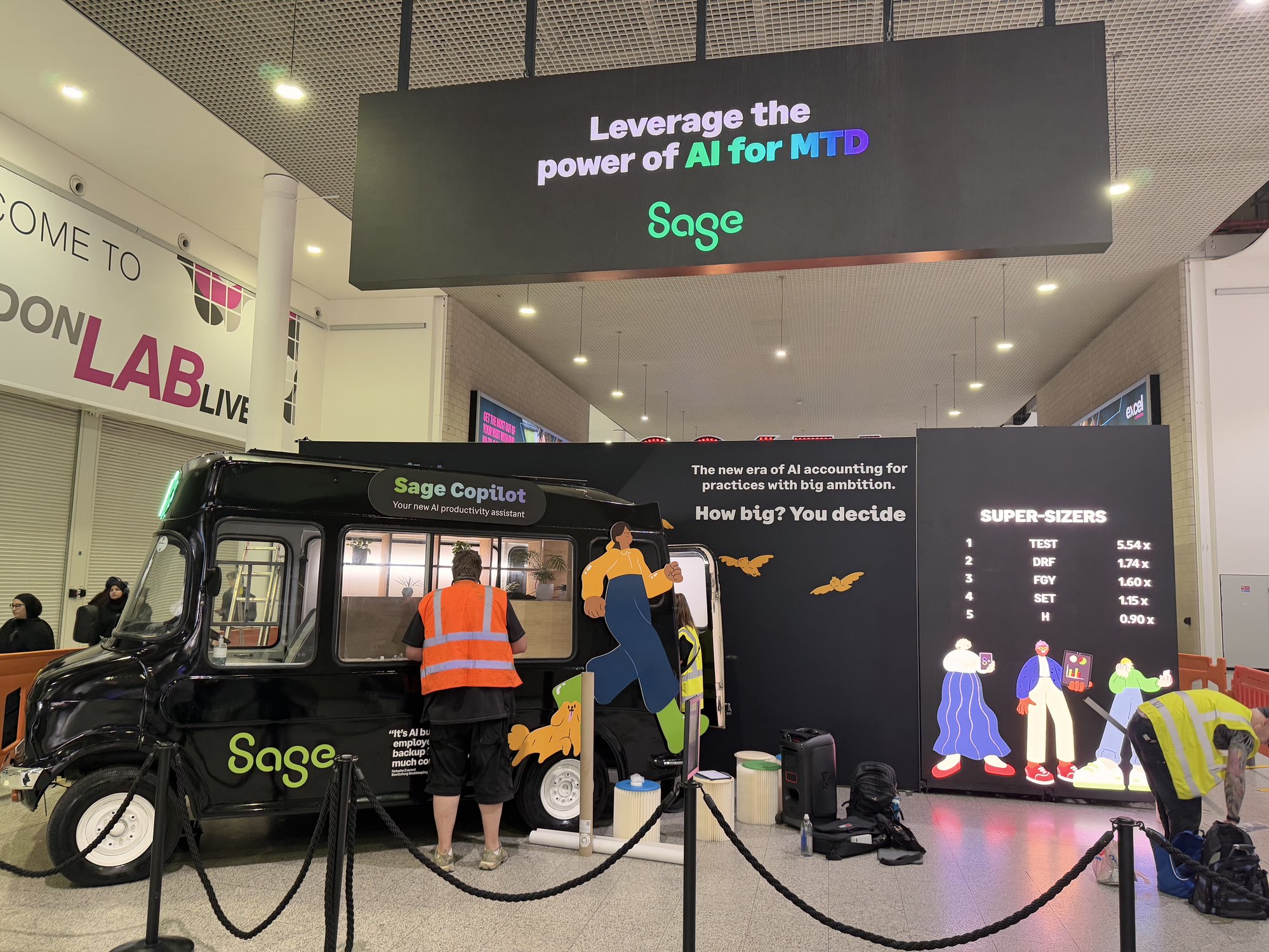 Sage Supersize stand seen wide, 2025